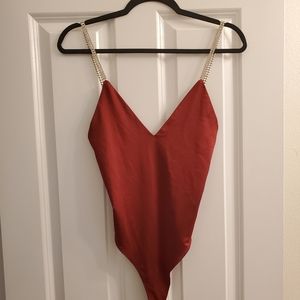Burgundy body suit with rhinestones
